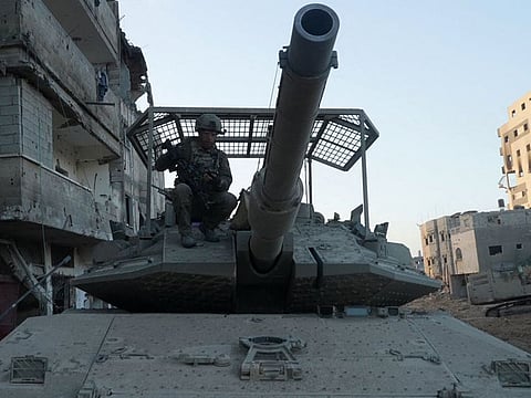 Israeli troops are pictured during operations in northern Gaza on November 8, 2023, amid continuing battles between Israel and the Palestinian militant group Hamas. 