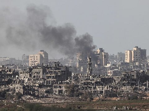 This picture taken from the Israeli side of the border with the Gaza Strip on November 10, 2023 shows billowing smoke following the Israeli bombardment of the Gaza Strip, amid ongoing battles between Israel and the Palestinian Hamas movement. 