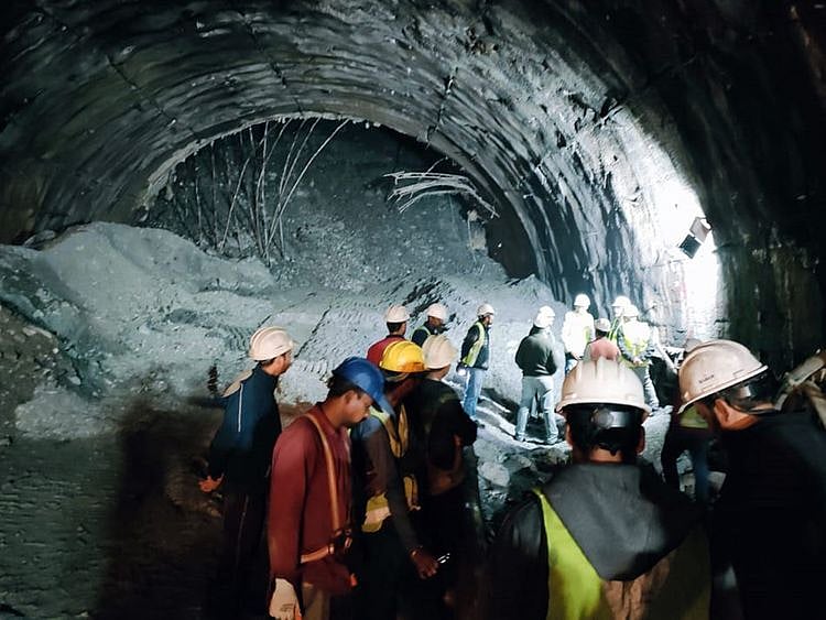 State Disaster Response Force (SDRF) and Police Revenue teams during a rescue operation at an under-construction tunnel from Silkyara to Dandalgaon that collapsed, in Uttarkashi.  