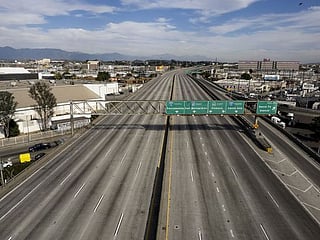 Fire that indefinitely closed section of vital Los Angeles freeway was arson, governor says