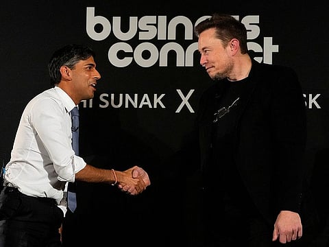 British Prime Minister Rishi Sunak shakes hands with Tesla and SpaceX's CEO Elon Musk after an in-conversation event, in London, Britain, Thursday, Nov. 2, 2023. 