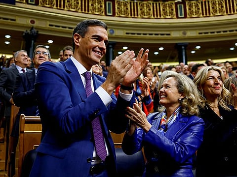 Spain's newly re-appointed Prime Minister Pedro Sanchez applauds after the voting at the investiture debate, as Spain's Socialists clinched a new term following a deal with the Catalan separatist Junts party for government support, a pact which involves amnesties for people involved with Catalonia's failed 2017 independence bid, in Madrid, Spain November 16, 2023. 