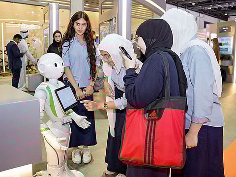 Visitors at the Dubai Electricity and Water Authority (DEWA) stall at WETEX at the Dubai World Trade Centre. 