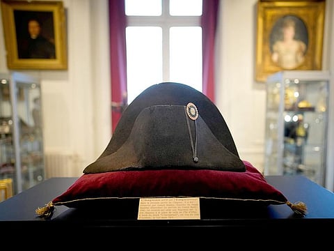 One of the signature broad, black hats that Napoleon wore when he ruled 19th century France and waged war in Europe is on display at Osenat's auction house in Fontainebleau, south of Paris. 
