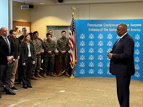 United States Secretary of Defense Lloyd Austin (R) speaks to employees of the US embassy in Kyiv during his visit to Ukraine on November 20, 2023.