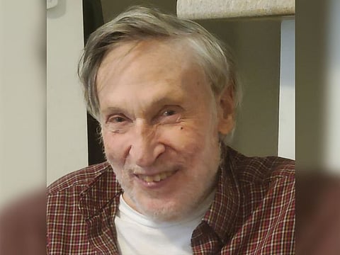 In this photo provided by Ed Smith, Geoffrey Holt smiles on Sept. 12, 2022. Holt left the town of Hinsdale, N.H., nearly $4 million when he died last June.