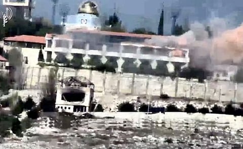 A strike on what Israel military says is a Hezbollah target in a location given as Lebanon is seen in this screengrab taken from a handout video obtained by Reuters on November 20, 2023.  