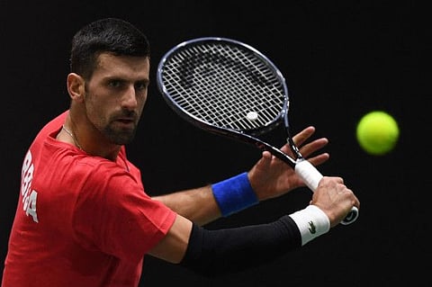 Serbia's Novak Djokovic takes part in a training session during the Davis Cup tournament at the Martin Carpena sportshall, in Malaga on Wednesday.