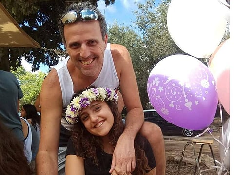 Family photograph of Eitan Gonen and his daughter Romi Gonen who is held hostage by Palestinian Islamist group Hamas