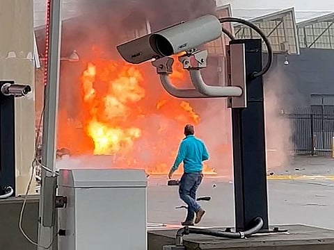 A vehicle burns at the Rainbow Bridge U.S. border crossing with Canada, in Niagara Falls, New York, US.
