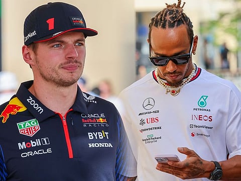 Max Verstappen (left) and Lewis Hamilton, archrivals and dominant F1 drivers. Recent reports linked the Mercedes driver to a move to Red Bull, but Hamilton has stoutly denied it.
