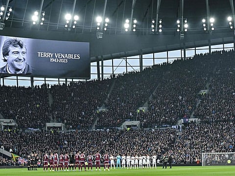 A picture of former England player and coach Terry Venables is shown on the video screen as team players pay tribute prior to the Premier League match between Tottenham Hotspur and Aston Villa on November 26.