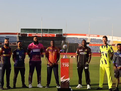 From left: Captains pose with the Abu Dhabi T10 trophy at the Sheikh Zayed Cricket Stadium on Monday.