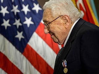 Life in pictures of US diplomat Henry Kissinger