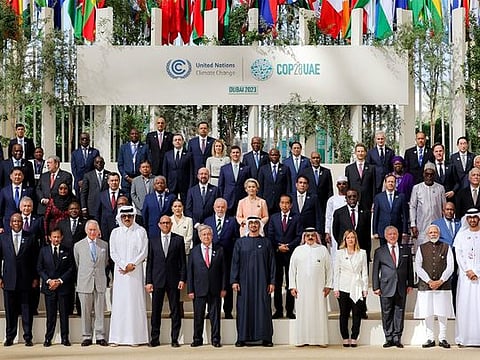 President His Highness Sheikh Mohamed Bin Zayed Al Nahyan with COP28 organisers and participants