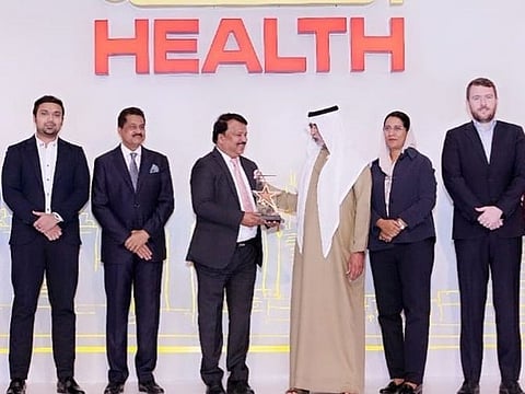 Dr K P Hussain, Chairman, FMC Network UAE receives the Annual Health Award from Shaikh Mubarak Al Nahyan, UAE Minister of Tolerance and Co-existence