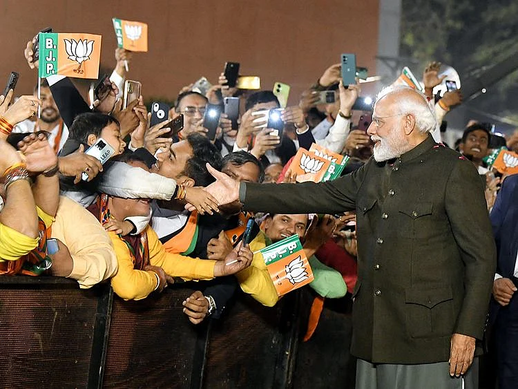 Prime Minister Narendra Modi arrives to attend the BJP’s victory celebrations in New Delhi on Sunday. 