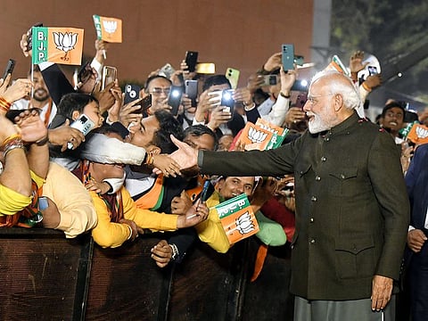 Prime Minister Narendra Modi arrives to attend the BJP’s victory celebrations in New Delhi on Sunday. 