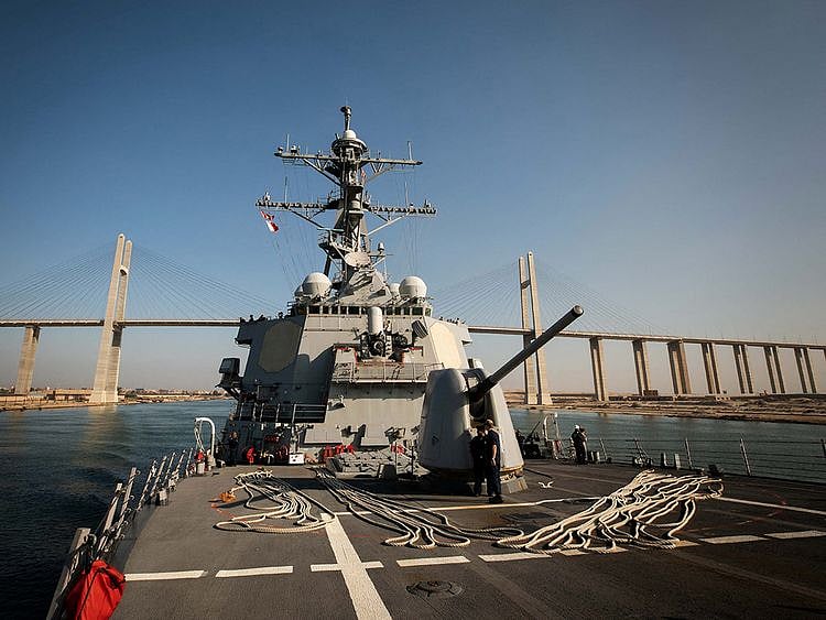 The US Navy Arleigh Burke-class guided-missile destroyer USS Carney transits the Suez Canal, Egypt, October 18, 2023. USS Carney and multiple commercial ships came under attack on December 3, 2023 in the Red Sea, the Pentagon said. 