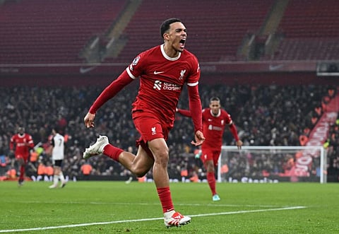 Liverpool's defender Trent Alexander-Arnold celebrates after scoring their fourth goal during the Premier League match against Fulham at Anfield in Liverpool on Sunday.