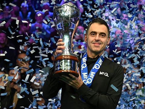 England's Ronnie O'Sullivan with the trophy after his victory over China's Ding Junhui in the final of the 2023 MrQ UK Championship at the York Barbican in York  on Sunday.