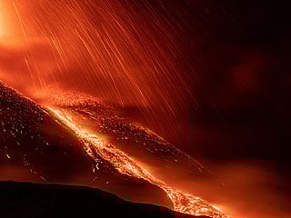 Photos: Italy's Mount Etna lights up night sky in stunning eruption