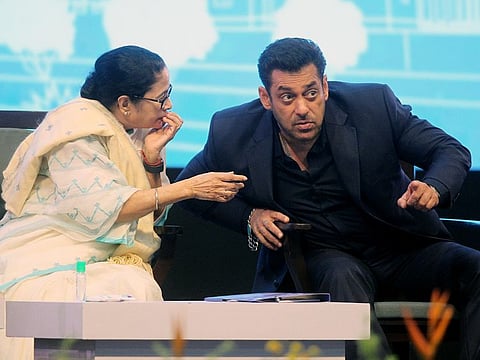 West Bengal Chief Minister Mamata Banerjee interacts with Bollywood actor Salman Khan at the opening ceremony of the 29th Kolkata International Film Festival (KIFF), at the Netaji Indoor Stadium, in Kolkata on Tuesday. 