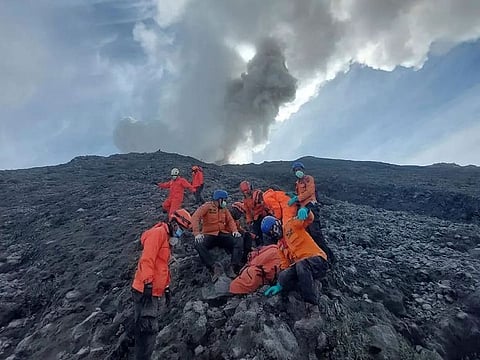 Rescuers searching the hazardous slopes of Indonesia's Marapi volcano found more bodies among the climbers caught by a surprise eruption.