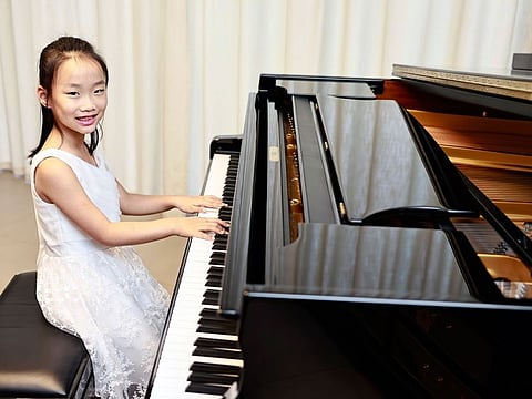 Anran Su says playing the piano makes her happy. 