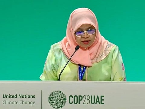 Maimunah Mohd Sharif reads out the Joint Outcome Statement on Urbanisation and Climate Change at COP28 at Expo City Dubai on Wednesday