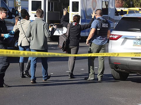 Police work at the scene of a fatal shooting that killed several people on the University of Nevada, Las Vegas campus.