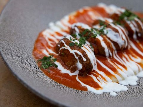 Authentic Greek Soutzoukakia recipe: Perfectly spiced meatballs in tomato sauce