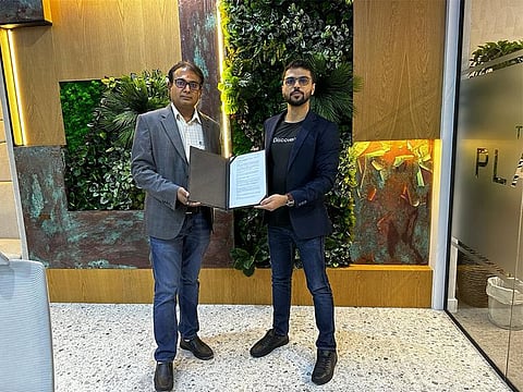 Mohammed Nihal Founder of Discoverrr PIM Solution and Rajesh Ravi Menon Director of Bluarrows Marketing announcing the partnership.