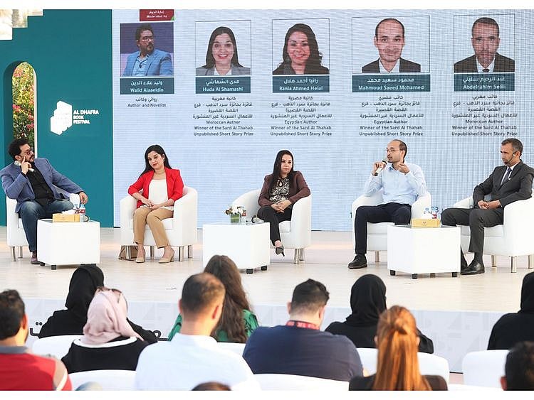 dhafra-book-festival-hosts-winners-of-short-stories-in-sarad-al-thahab-awards-in-zayed-city-public-park-on-dec-8-1702125732143