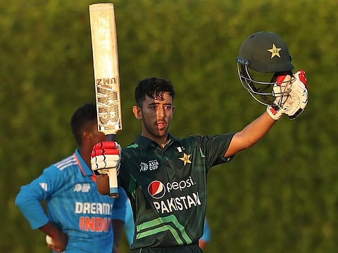 Azan Awais of Pakistan celebrates after reaching his century during the ACC Men's U19 Asia Cup Group A match against India at the ICC Academy Ground on Sunday