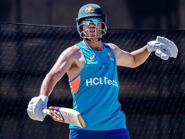 Australia's David Warner attends a training session