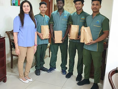 Indian expat Ruchi Mehra (left), a member of the group, has been gifting workers in her Bur Dubai building for the past 12 years