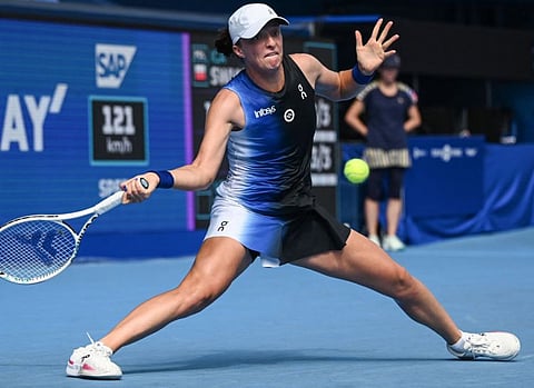 Poland's Iga Swiatek in action against Russia's Veronika Kudermetova during their women's singles quarter-final match of Pan Pacific Open in Tokyo in September.