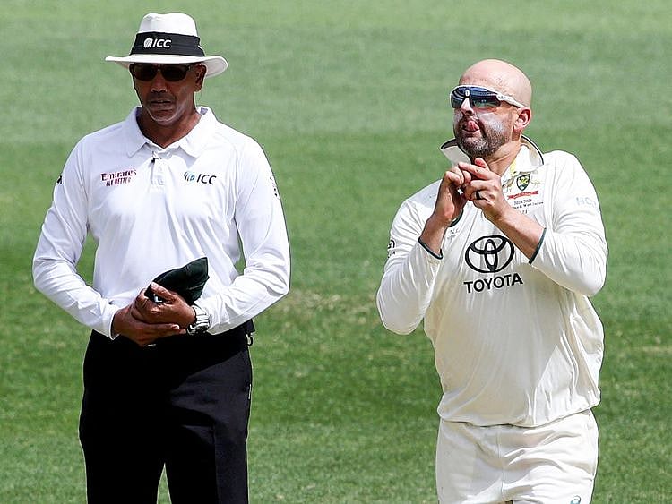 Australia's Nathan Lyon bowls 