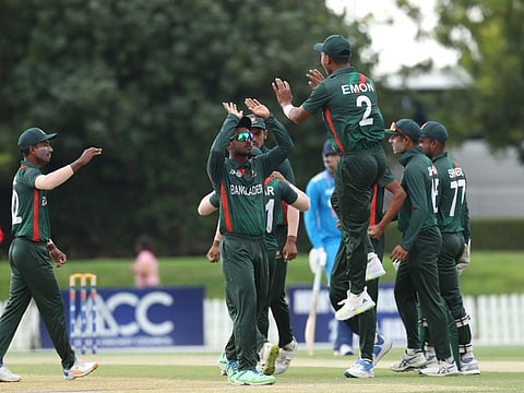 Bangladesh players celebrates the wicket of Adarsh Singh of India during the Under-19 Asia Cup semi-finals in Dubai on Friday.