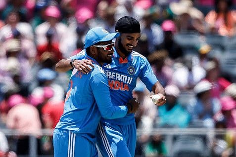India's Arshdeep Singh celebrates with teammate Sanju Samson his ODI five-wicket maiden during the 1st ODI cricket match against South Africa at The Wanderers Stadium in Johannesburg on Sunday.