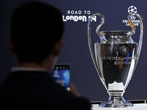 The Uefa Champions League cup ahead of the 2023-2024 Champions League round of 16 draw at the House of European Football in Nyon on Sunday.