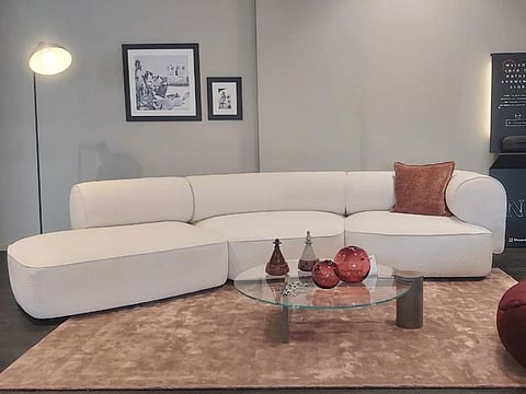 Melody: Designed by the esteemed Simone Bonanni Studio, crafted to perfection, this modular sofa seamlessly combines materials and space, reflecting a timeless elegance. 