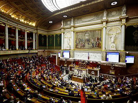 A general view shows the hemicycle during the questions to the government session at the National Assembly ahead of a vote by members of parliament on immigration bill in Paris, France, December 19, 2023.   