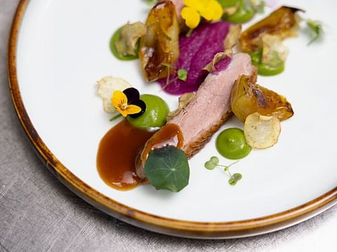 Pan-seared duck breast with brussels sprouts and caramelised apple