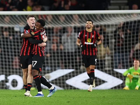 Bournemouth's Luis Sinisterra celebrates scoring their third goal with Alex Scott during the Premier League match against Fulham at Vitality Stadium on Tuesday.