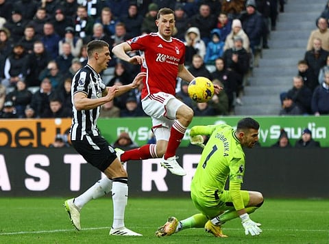 Nottingham Forest's Chris Wood scores their second goal during a Premier League match against Newcastle United at St James' Park, Newcastle on Tuesday.