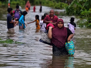 Photos: Six dead, tens of thousands hit by southern Thailand flooding