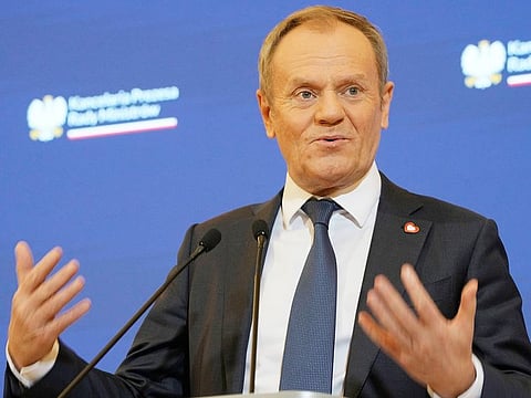 Poland's new Prime Minister Donald Tusk tells during a news conference that his pro-European Union government is urgently preparing a new spending bill to secure raises for teachers and re-dedicate some 3 billion zlotys ($762 million), originally meant for state media, to children's health, after President Andrzej Duda, allied with the opposition party, vetoed the previous bill that earmarked funds for state media, in Warsaw, on Wednesday December 27, 2023. 
