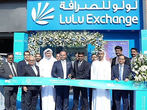 Satish Kumar Sivan, Consul General of India to Dubai and Northern Emirates, Adeeb Ahamed, Managing Director of LuLu Financial Holdings, and other senior management members of LuLu Exchange inaugurate the 100th branch in the UAE
